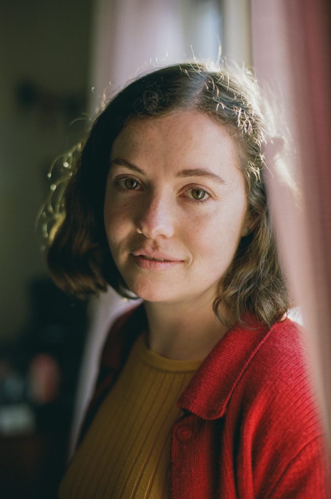 Clare smiling softly